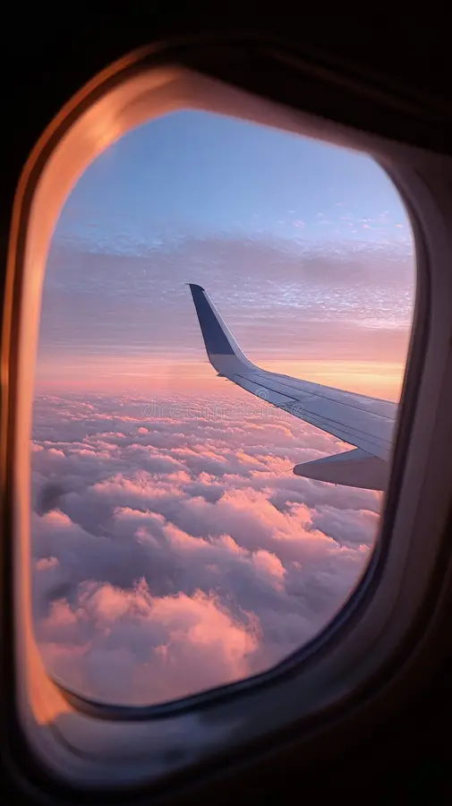 Sunset viewed through an aeroplane window